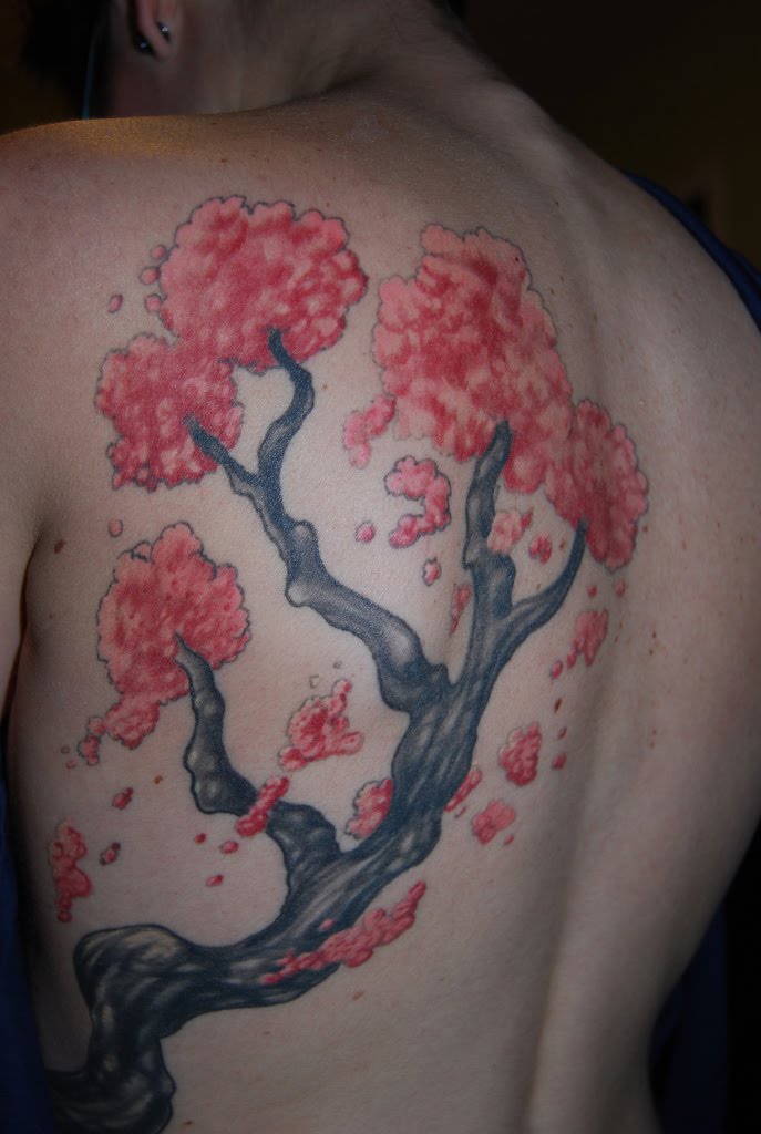 I finish my tattoo photos with this cherry blossom tree stunning tattoo