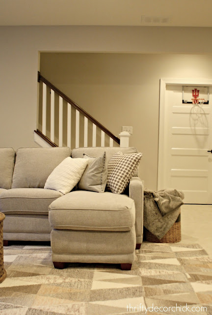 stairs with stained and white stair railing