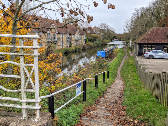 Cross the bridge at Cambridge Road then take the towpath on the left