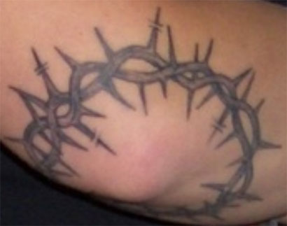 Sacred heart praying hands and crown of thorns tattoo