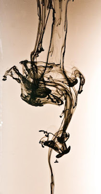 Ink in water to create a sense of colour, paint and movement. 