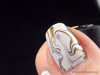 Pink, white and black water marble effect mani