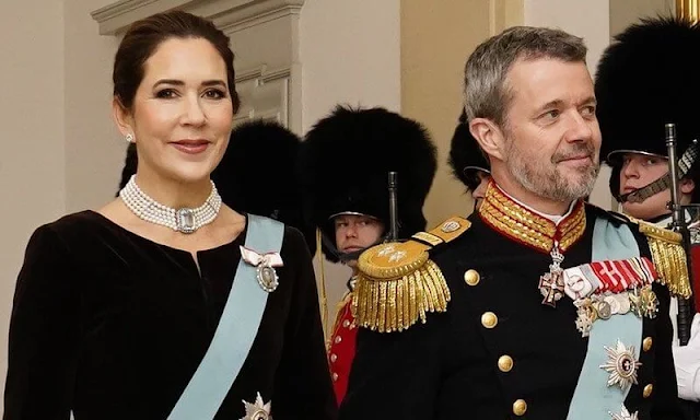 Crown Princess Mary wore a black velvet short jacket, and beige ball skirt by Rachel Gilbert. Pearls necklace. Queen Margrethe