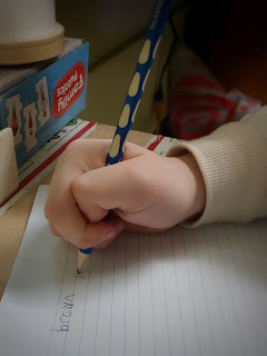 pencil grasp with "thumb-wrap"
