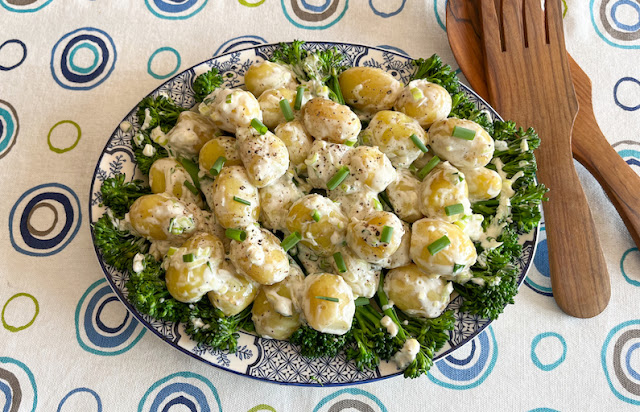 Food Lust People Love: This tenderstem broccoli (broccolini) potato salad is made with Jersey Royal potatoes and a tangy, light, creamy dressing. It’s pretty much the perfect side for your next barbecue or brunch buffet.
