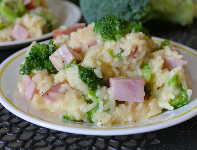 This ham cheesy broccoli rice dinner skillet is easy, delicious and one you'll want to add to your menu plan! Use any cheese you prefer and great for using leftover Easter or Christmas ham! Ready in less than 30 minutes which makes it perfect for a simple and affordable weeknight meal! 