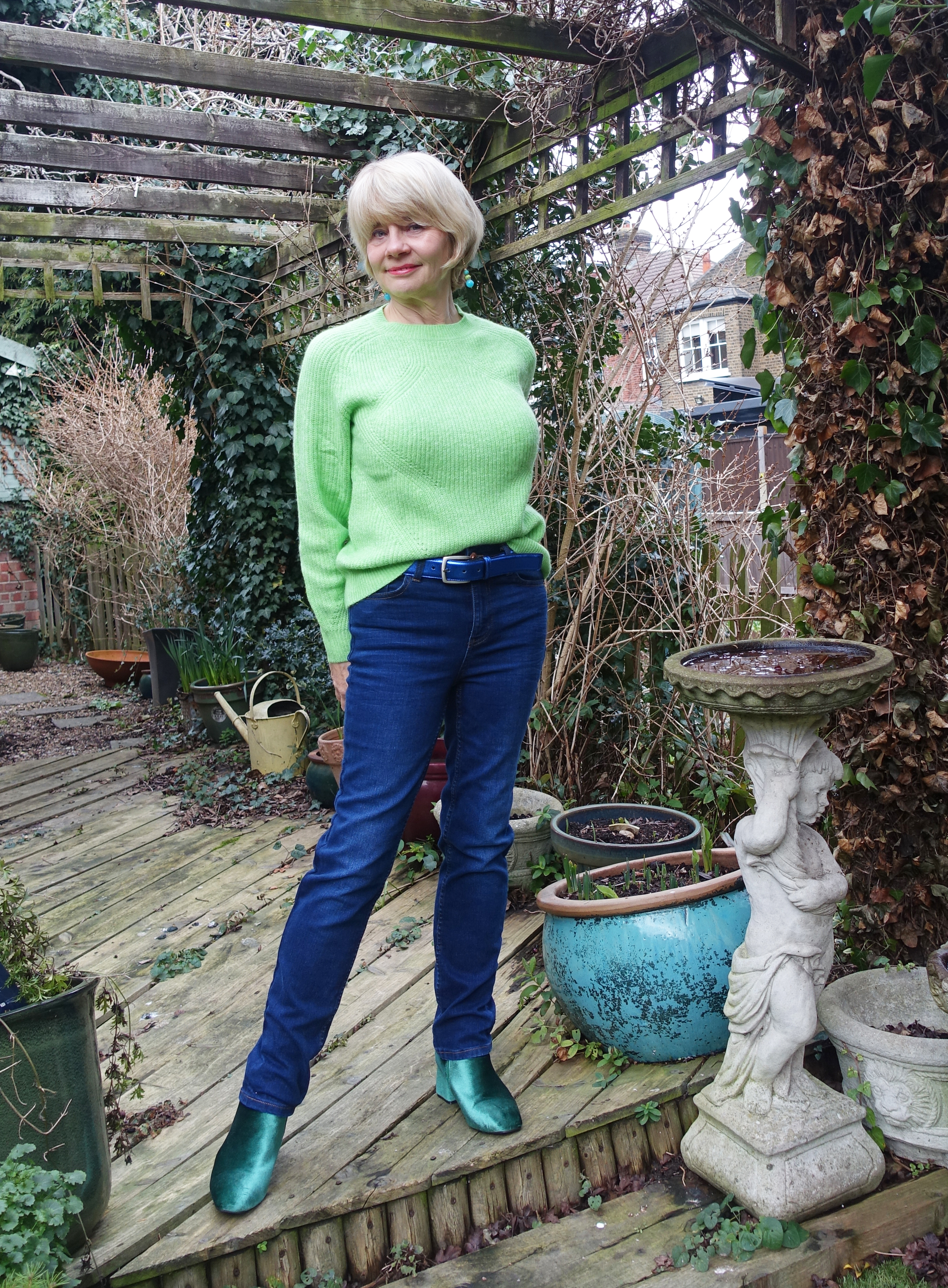 Casual brights:  lime green jumper from M&S with jeans and green boots as Is This Mutton's crusade continues to get women wearing bright colours over 50