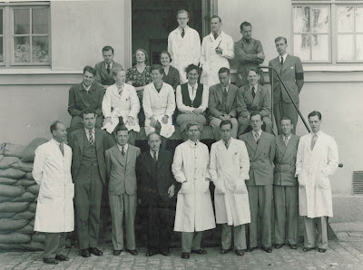 Elmer Kraemer, front row, third from left, and Wallace Carothers, front row to right of Kraemer, pose circa the 1930's next to the DuPont advanced chemistry research teams they led that invented polyester and nylon