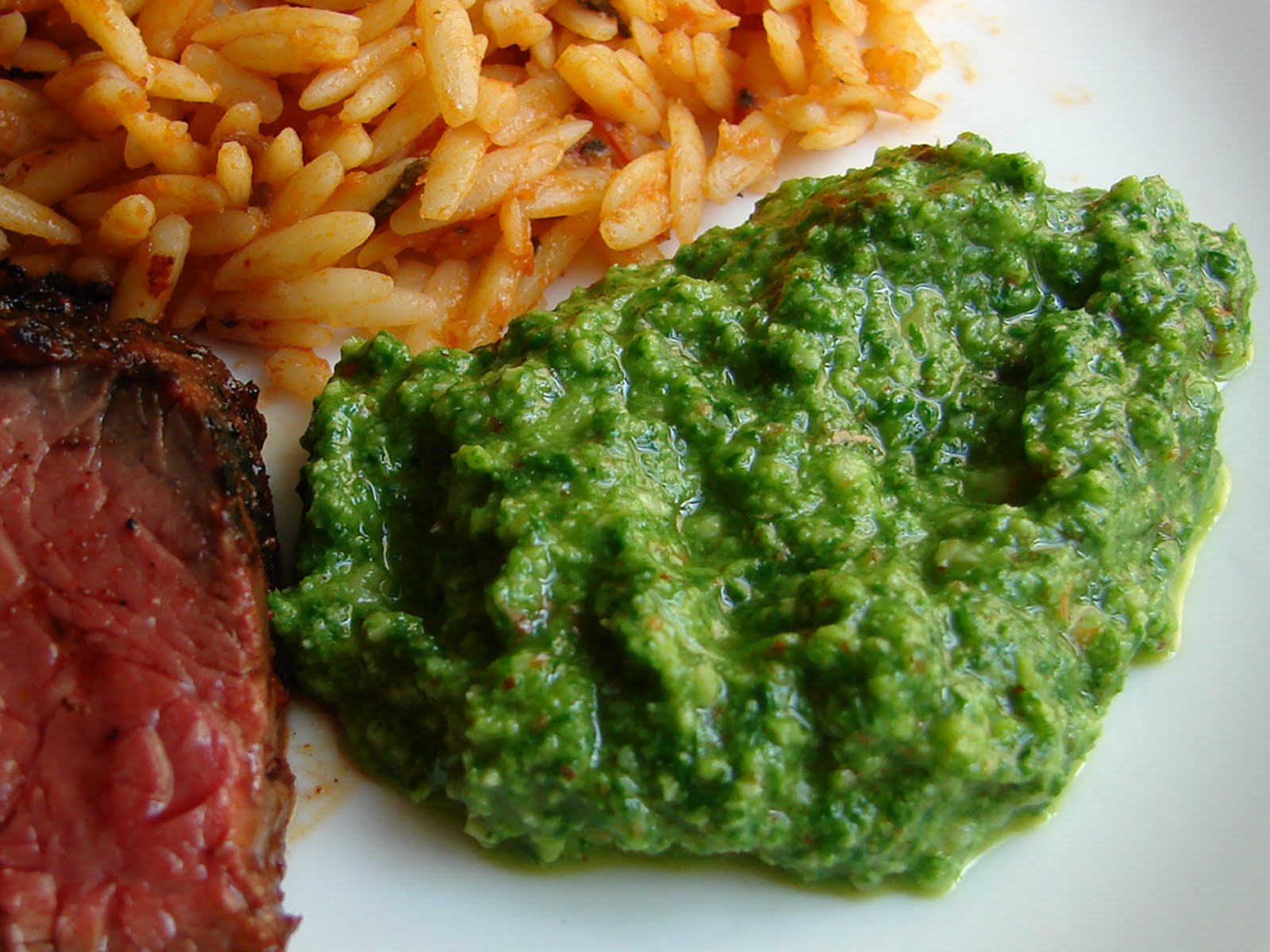  but real light-green video recipe for an almond arugula pesto Almond Arugula Pesto – About every bit Subtle every bit a Shovel to the Face
