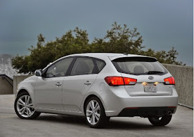 Rear 3/4 view of 2011 Kia Forte 5-door