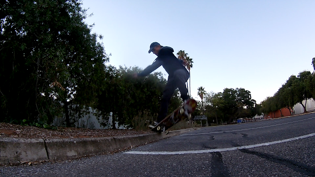 TET Front Side Ollie to Tail Stall on a Curb.