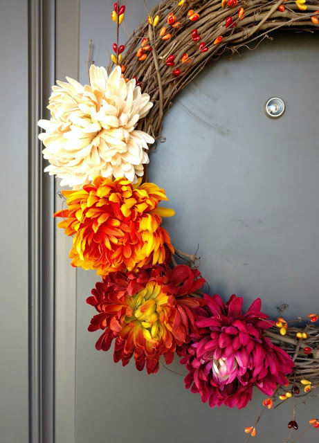 Wreaths are an easy way to add a little decor for any season.  This fall flowers and berries wreath can be made for less than 1/2 the price of a store bought one in about 30 minutes!