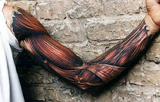 3d tattoo of the muscles and tendons covering the arm
