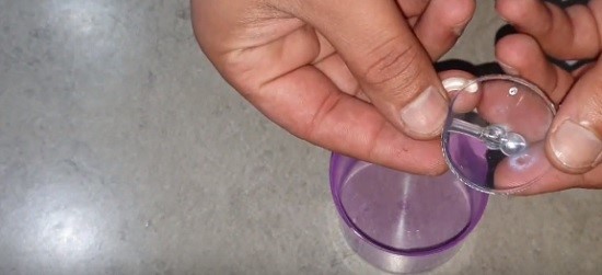 A bottle lid and a suction cup