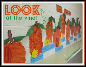 Pumpkins on display with crepe paper 'vine' collaborative display via RainbowsWithinReach