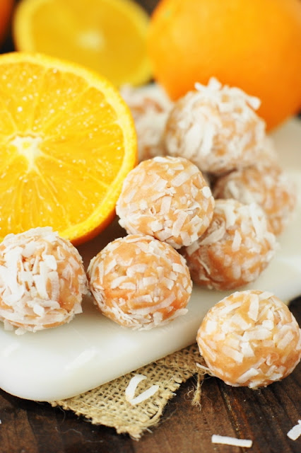 Orange-Coconut Balls ~ Orange lovers, these are for you!  Because these little bite-sized beauties pack a huge orange punch.   www.thekitchenismyplayground.com