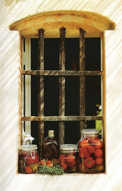 A Well Kept Home, preserves in glass bottles sitting on window sill, edited by lb for linenandlavender.net