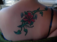 Butterfly and Flower Tattoos on Back