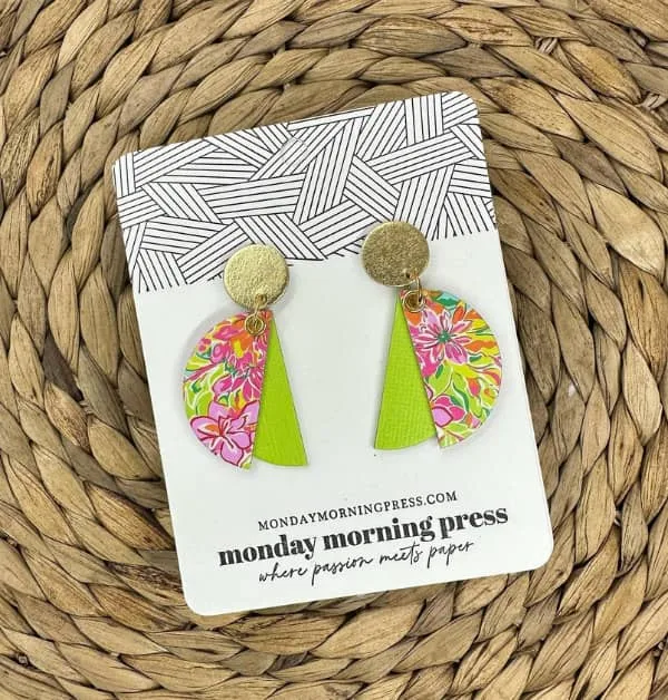 pink and neon green paper earrings on shop backing card