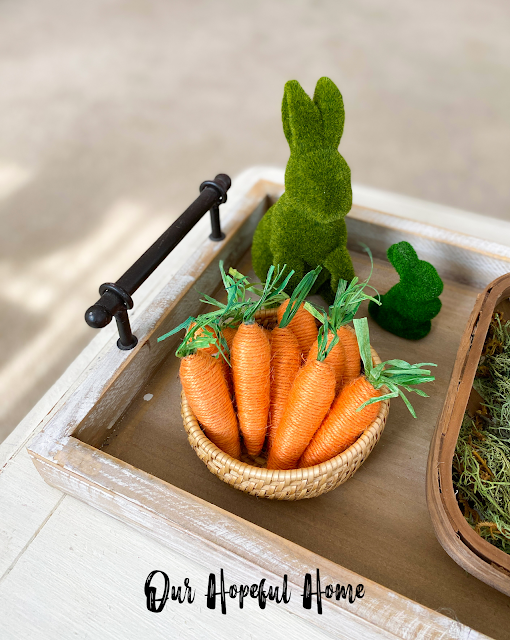 basket filled with orange jute carrots moss bunny rabbit