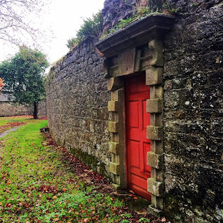 Red door in wall, Duckett's Grove Castle