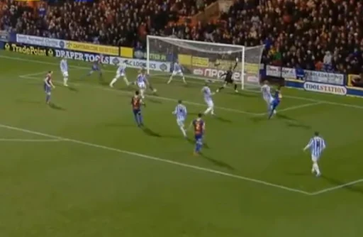 Wilfried Zaha scores to give Crystal Palace the lead against Huddersfield