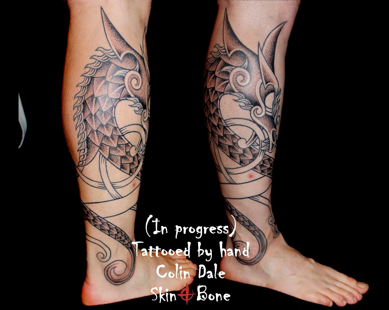 Monochrome double dragon tattoo