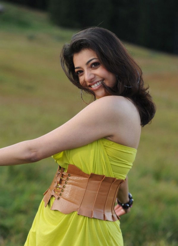 Spicy Kajal Agarwal In Hot Mood Yellow Dress Latest Stills Photos hot images