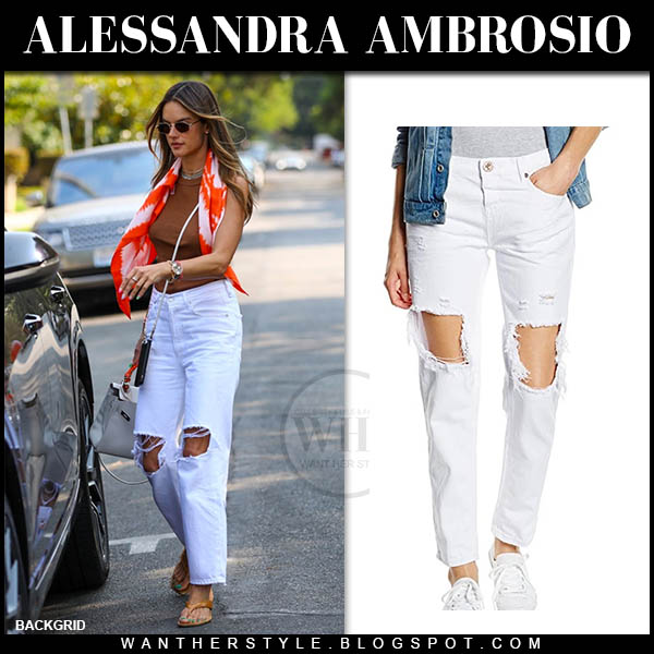 Alessandra Ambrosio in white ripped jeans, brown top and printed silk scarf