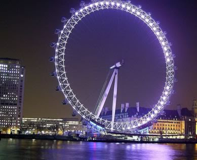 The London Eye at night on the western end of Jubilee Gardens.