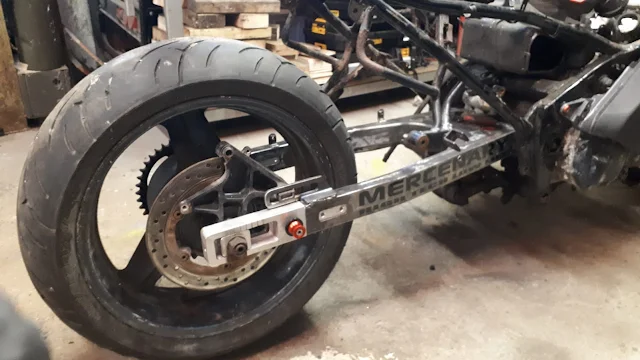 Mercenary Garage Custom Motorcycle Workshop December 2024 Project Big Honda CBR1000F Stretched Lowered Swingarm Extensions Matte Black Rat Drag Racer Touring bike