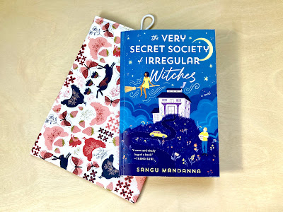 A paperback copy of the book The Very Secret Society of Irregular Witches.