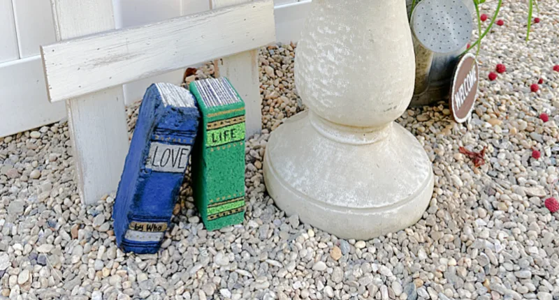 garden bricks in the pea gravel garden with ladder and bird bath