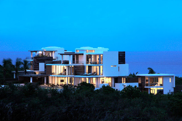 Modern villas with the ocean in the background