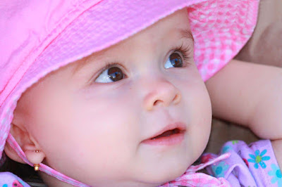 socute-baby-closepose-pink-dress-cap-walls