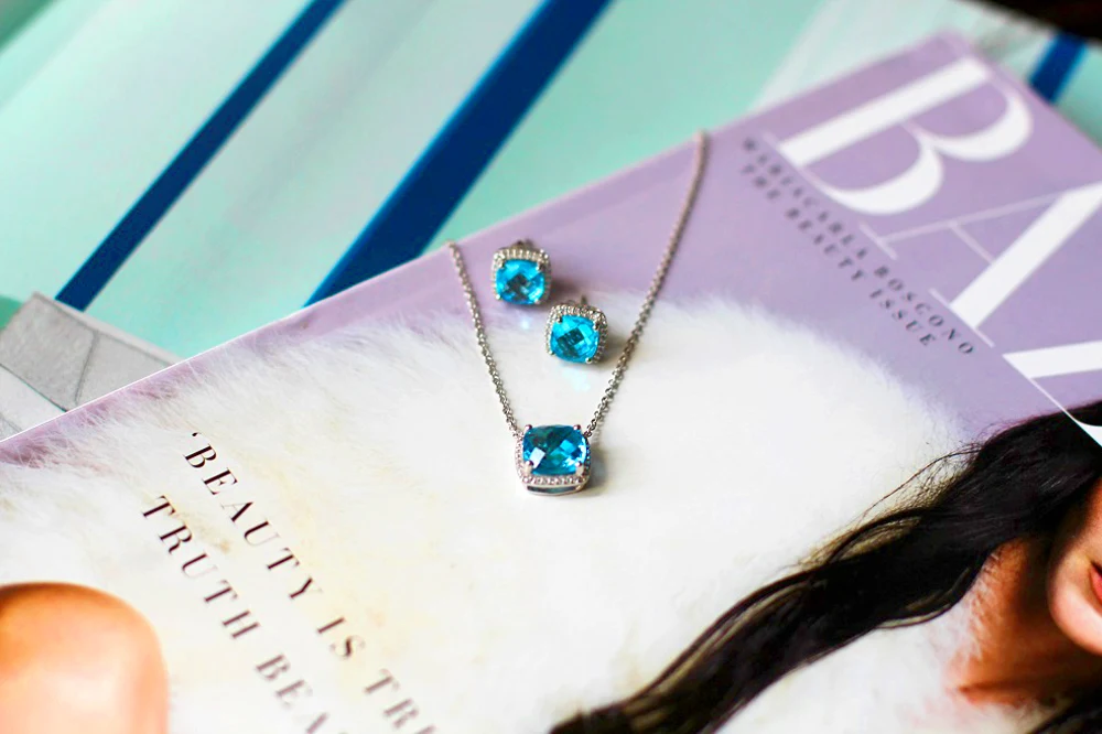Blue Nile Blue Topaz and White Topaz Single Halo Necklace & Stud Earrings - luxury style blog