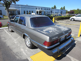 1979 Mercedes S-Class with old, faded, peeling paint.