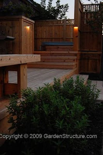 Hot Tub Surround and Deck Designed and Installed by Mark Schwarz of EarthScape, Our Builder in Kitchener Waterloo. There are still hot areas available for