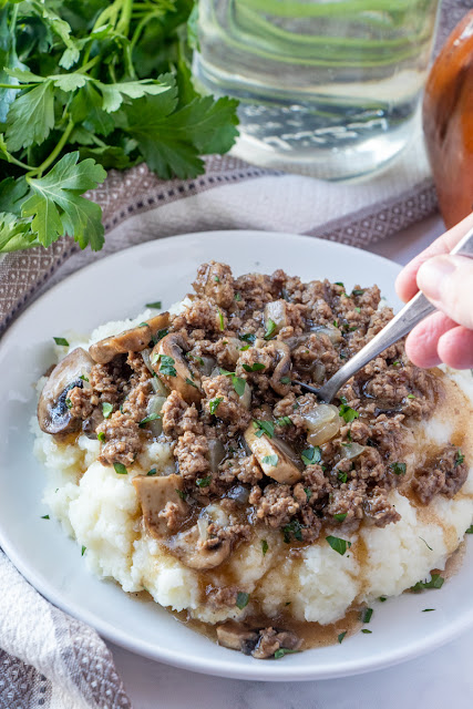 This meat and potatoes comfort food just like grandma used to make is the perfect easy dinner idea! Ready in less than 30 minutes and great served over mashed potatoes, baked potatoes, cooked rice or egg noodles! The mushrooms, onion and garlic add so much delicious flavor!