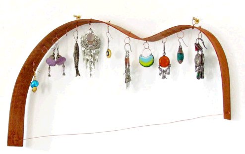 Earring rack made from guitar-making scrap by TheYarnKitchen via Etsy