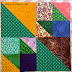 Color Play with Half Square Triangles - Green Four Patch block