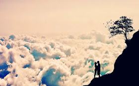 Couple-on-top-of-the-hill-touching-clouds-pics