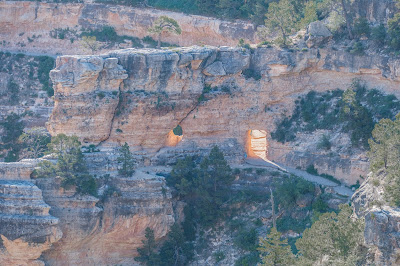 Photo of Sun Coming Through Entrance at Bright Angel Trail at the Grand Canyon