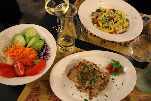 Insalata mista, seafood lasagna and pasta with fish at Trattoria Antico Calice, Venice.