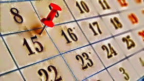 Illustration of a calendar with a red pin in it