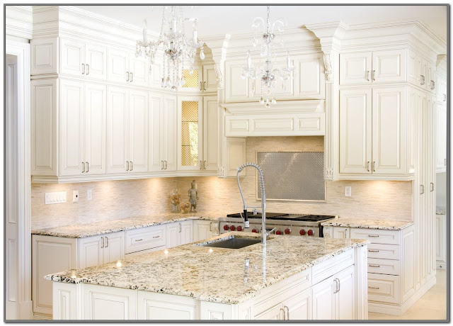 beige kitchen cabinets with white countertops