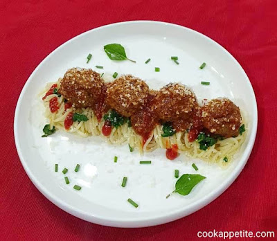 Meatballs on top of spaghetti.  This spaghetti and meatballs recipe is super easy to make and come out flavorful every time I make it. They are perfect as an appetizer, breakfast, much or dinner. In less than an hour you'll have a perfect and delicious meal. A pitch-perfect crowd pleaser. Everyone will fall in love.