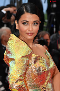 Aishwarya Rai in a Shoulder less Sleeveless Deep neck Golden Gown at A Hidden Life Screening Cannes .xyz Exclusive Pics 10.jpg