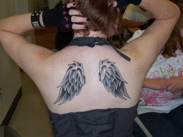 firefighter tattoos for girls. Angel Wing Tattoos For Girls