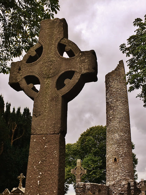 Round tower of monasterboice with celtic cross in Boyne Valley Ireland